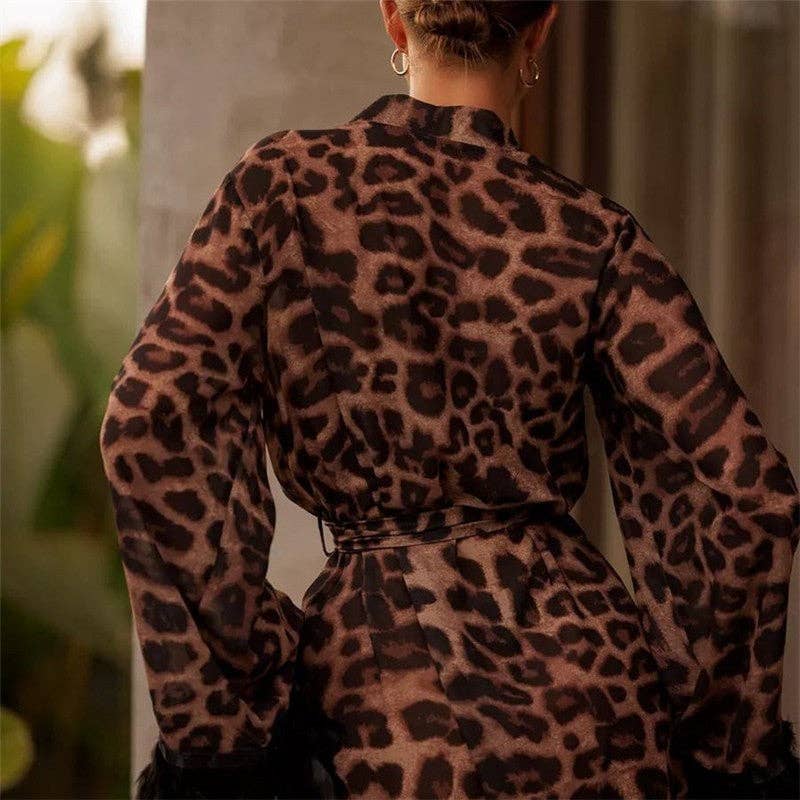 LEOPARDO Abito lungo con scollo a V patchwork in piume con stampa leopardata in vendita all'ingrosso su Faire2