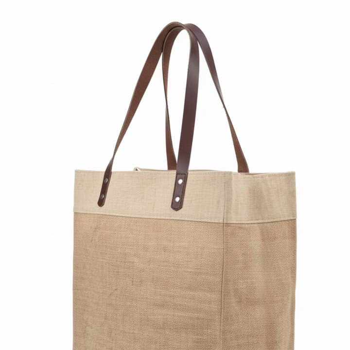 Jute Tote Bag with Genuine Leather Straps | Eco-Friend Bag and other Purchase Wholesale panderetas. Free Returns & Net 60 Terms on Faire trending on Faire.