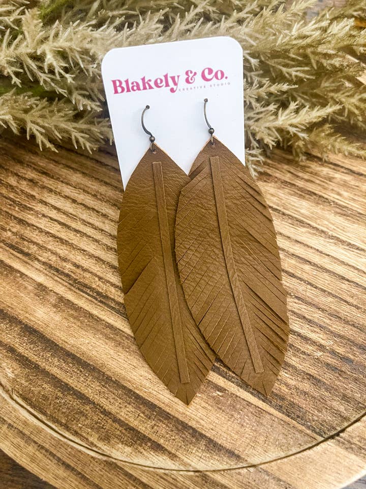 Light Brown Narrow Feather Faux Leather Earrings for wholesale by Blakely and Co.