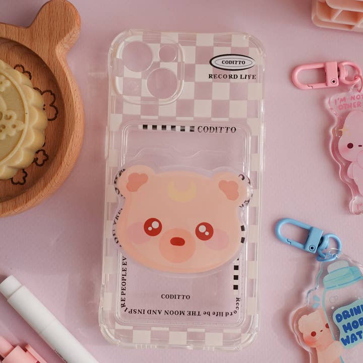 Pluto Phone Holder for wholesale by madebyshania