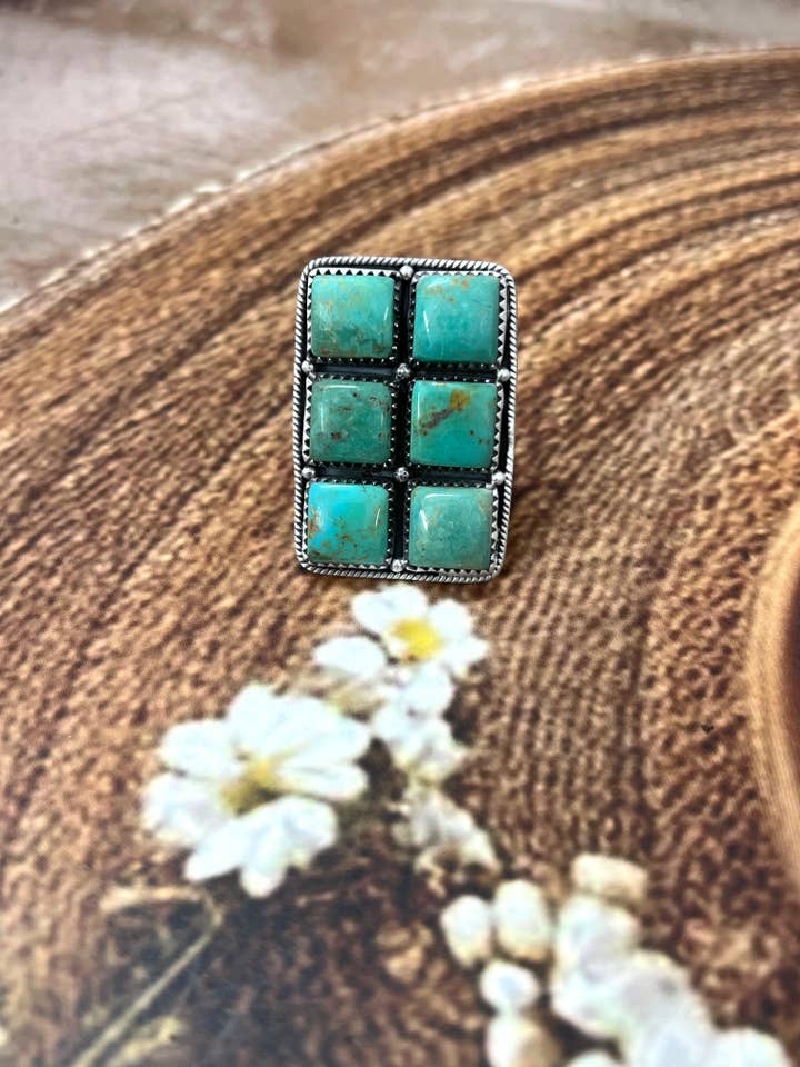 Handmade Sterling Silver Old Stock Royston Turquoise Adjustable Rings with Signed Nizhoni for wholesale by Nizhonitradersllc