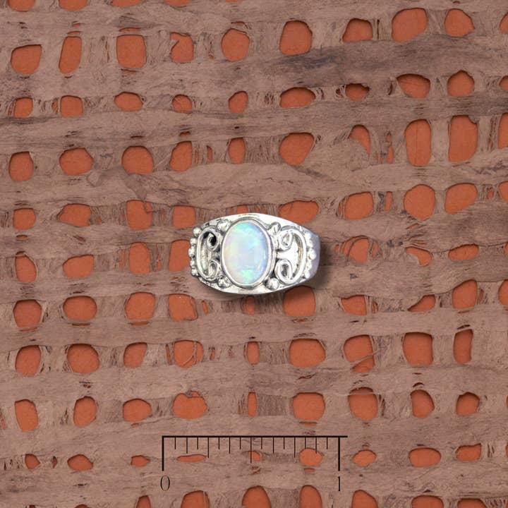 Oval opal sterling silver ring with designed bezel for wholesale by Tidepool