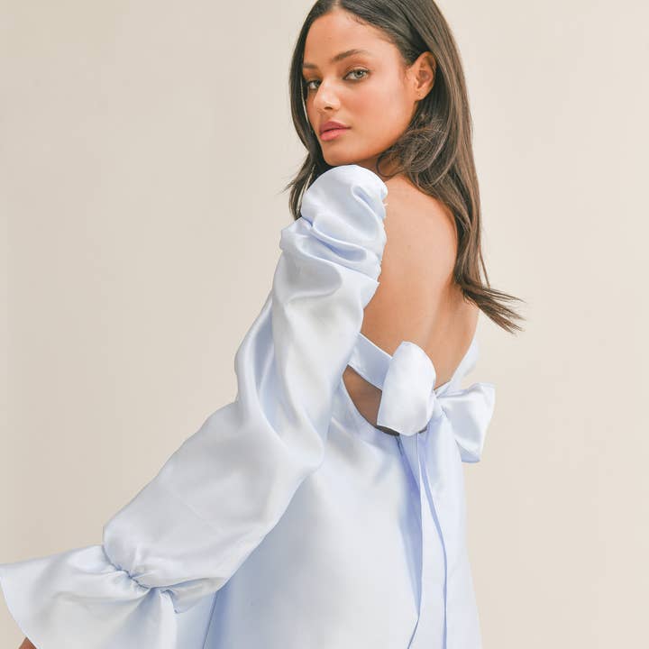 ID5954 BABYDOLL DRESS WITH LONG BELL PUFF SLEEVES AND BOW and other Purchase Wholesale merk kleding. Free Returns & Net 60 Terms on Faire trending on Faire.