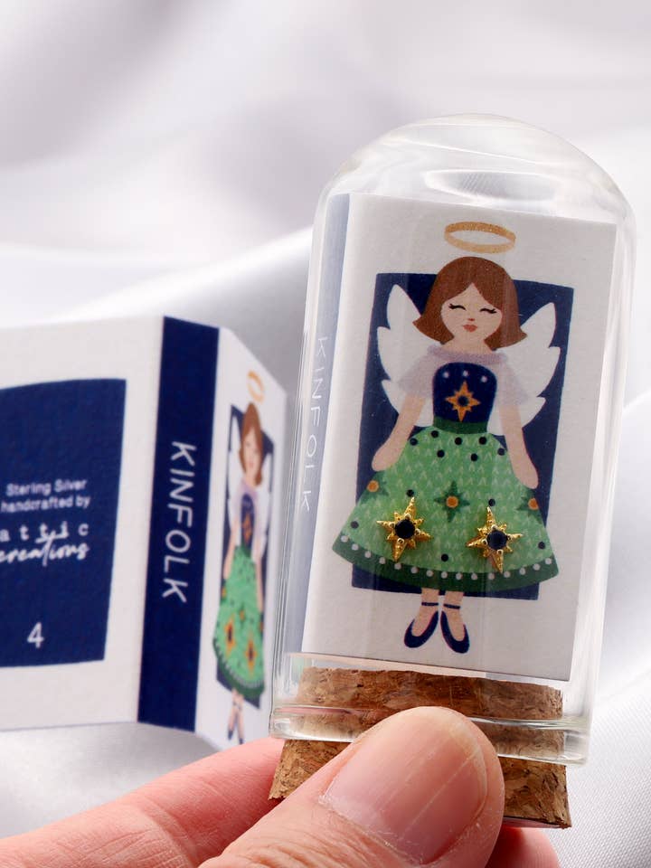 TT72004 KINFOLK Angel with North star BLUE crystal earrings for wholesale by Attic creations