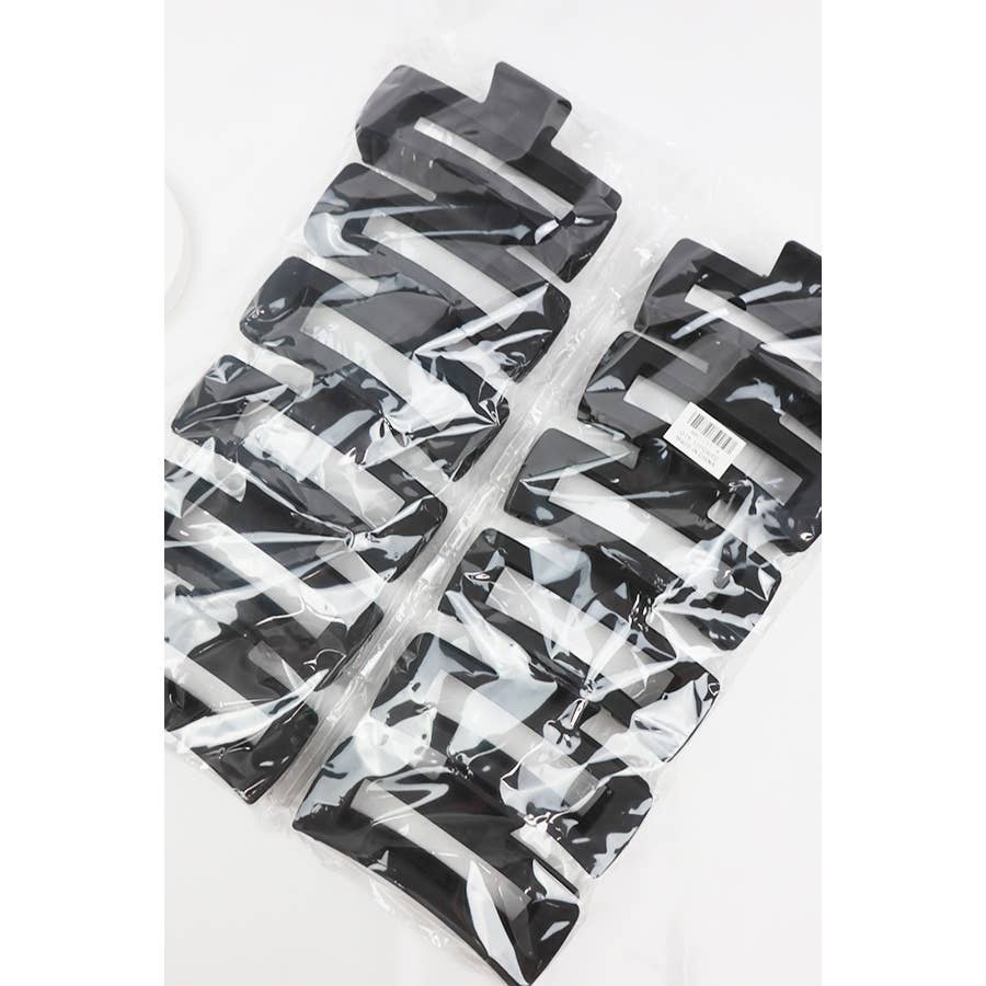 NOIR Pince à cheveux rectangulaire Jumbo Cut Out, noire en vente sur Faire5