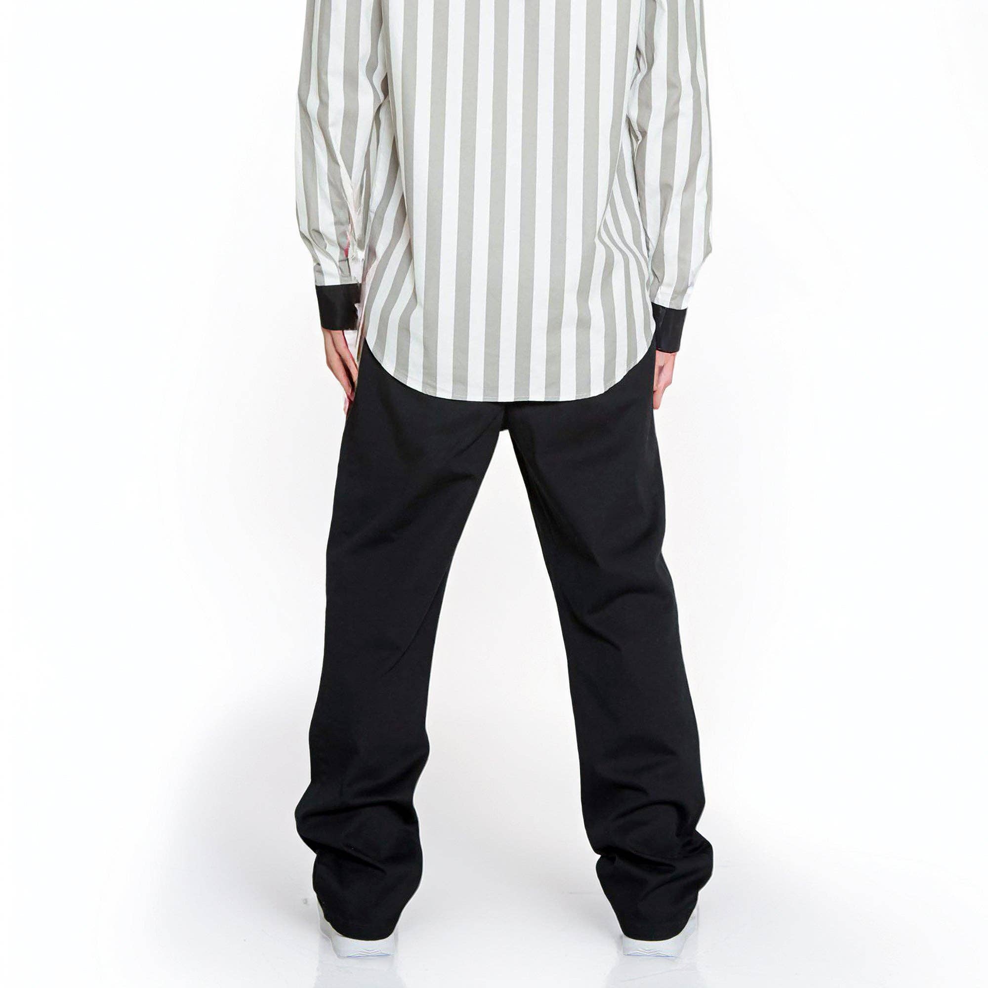 Svart Konus Herr Baggy Chinos i Svart för wholesale på Faire3