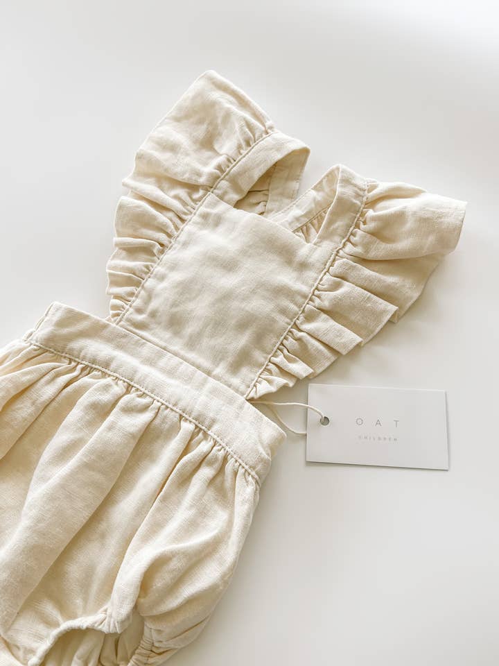 Linen Flutter Sleeve Bloomer Romper - Vanilla for wholesale by Oat Children