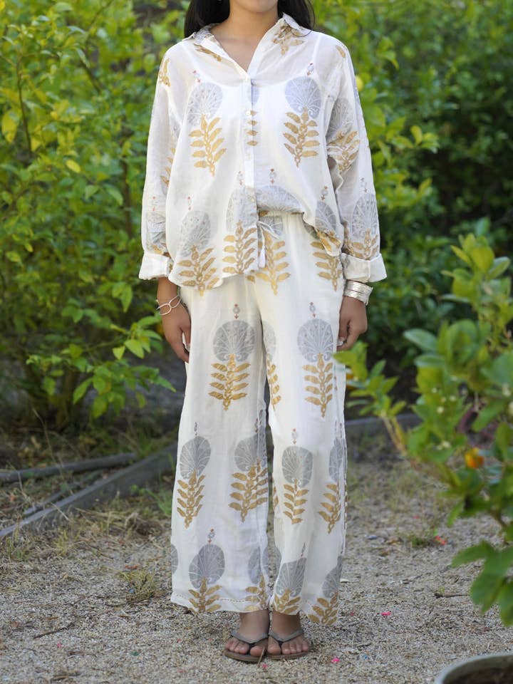 Calças Solene Metálicas com Estampa Flo por atacado de Dolma