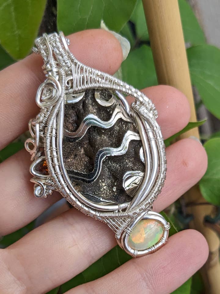 Pyrized Ammonite, Welo Opal, Orange Tourmaline Pendant for wholesale by Le Tourbillon Minéral