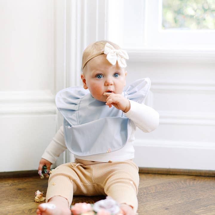 Sky Blue Angel Bib Girls Ruffle Waterproof Feeding Baby Bib for wholesale by BIBTIQUE