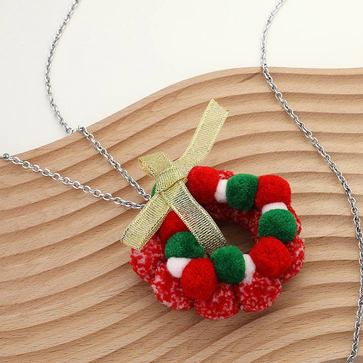 Sensibling Corp. – wholesale Pendant/charm necklace – Bow Pom Pom Wreath Long Pendant Necklace