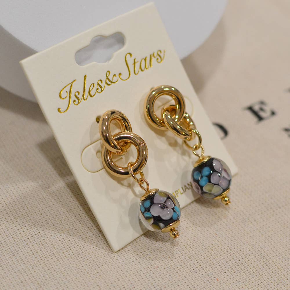 StarryNYC – Großhandel Ohrhänger – Ohrhänger in Kugelform aus Murano-Glas mit elegantem Muster5