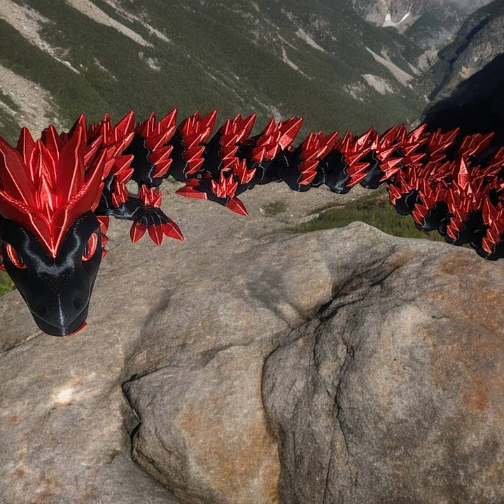 Fidget Dragon rouge et noir avec œuf pour la vente par Crafted Mayhem