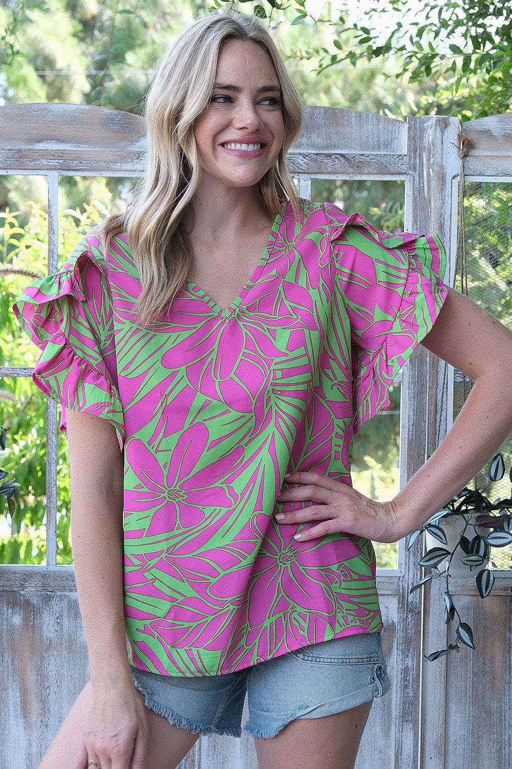 FUCHSIA GREEN ST2407-E - PRINTED WOVEN  RUFFLED TULIP SLEEVE V NECK TOP  for wholesale on Faire4