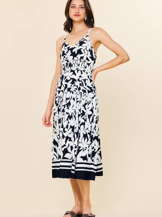 Robe midi smockée à imprimé floral pour la vente par SKIES ARE BLUE