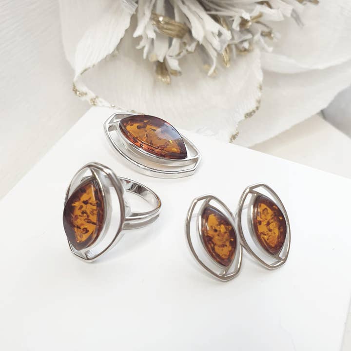 Natural shuttle cognac amber earrings, sterling silver for wholesale on Faire2