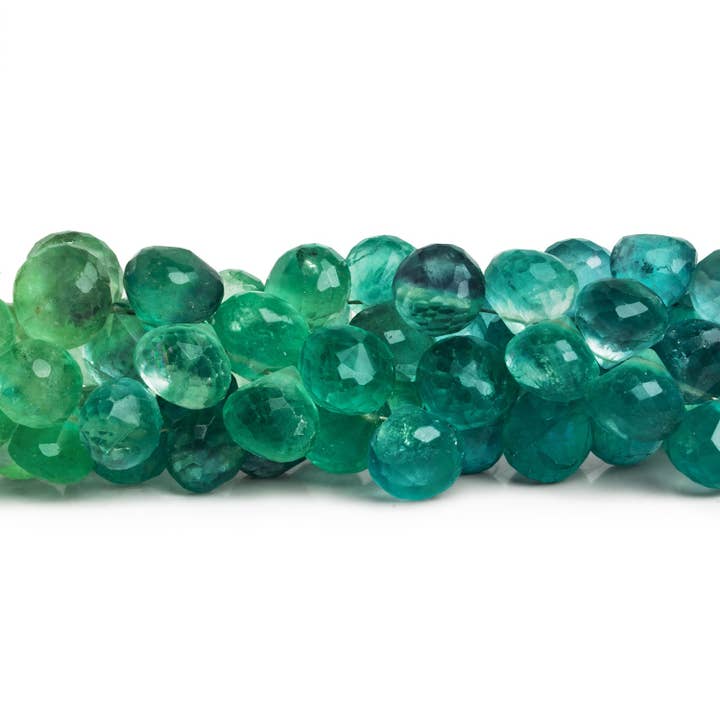 8-10mm Neon Teal Fluorit Fasetterade Godiskarameller 7,5 tum 43 pärlor för wholesale av The Bead Traders