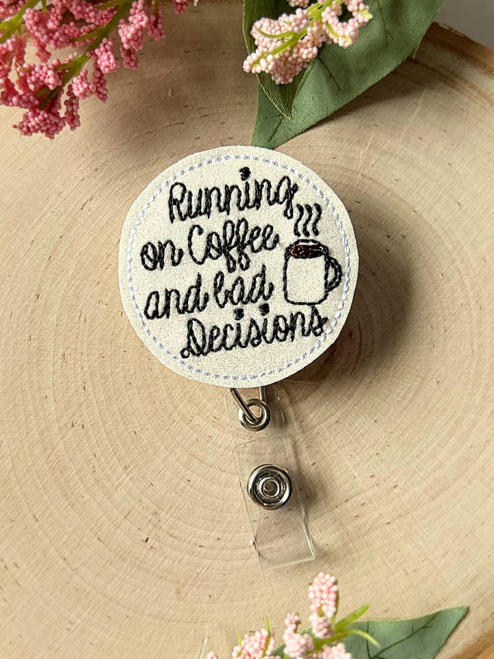 Running On Coffee & Bad Decisions Nurse Badge Reel for wholesale by Meeko’s Must Haves