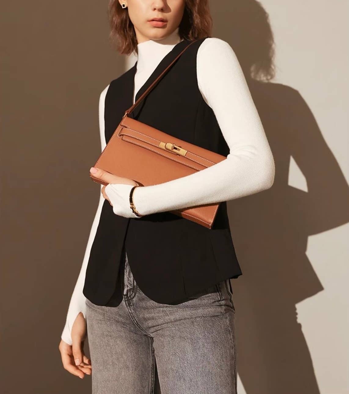 Sook Stainable - Vendita all'ingrosso Tracolla - Donna - Borsa a tracolla a busta in vera pelle con chiusura metallica5