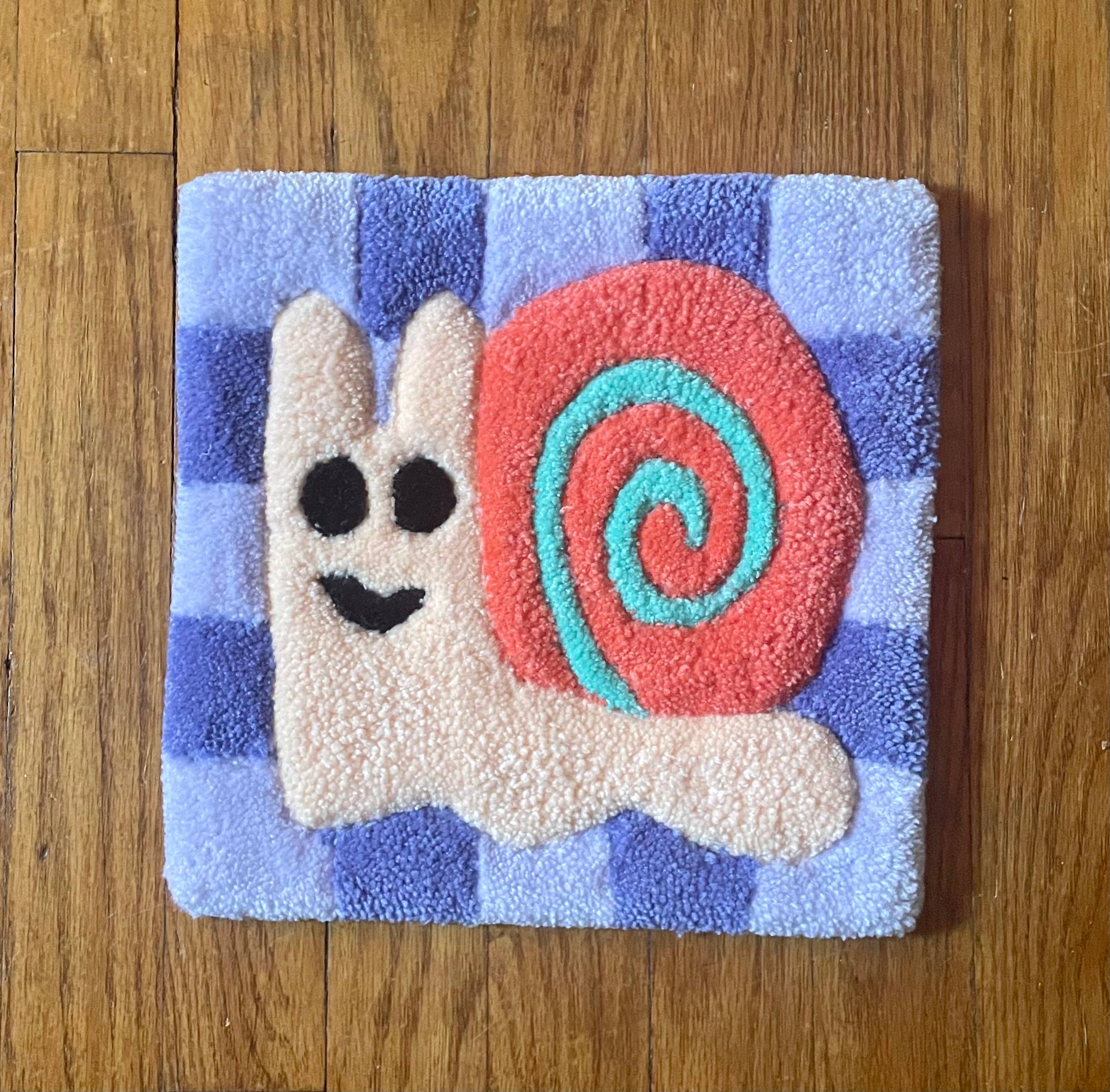 Hi Cutie – wholesale Wall Accent – Checkered Snail Tufted Wall Hanging