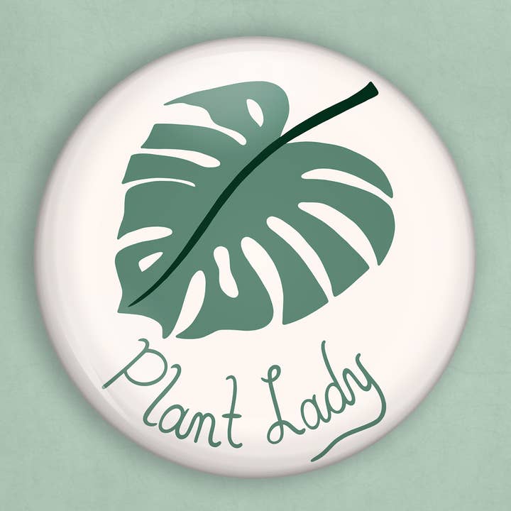 Plant lady monstera leaf pin (1 inch diameter) for wholesale by Caroline W Illustration