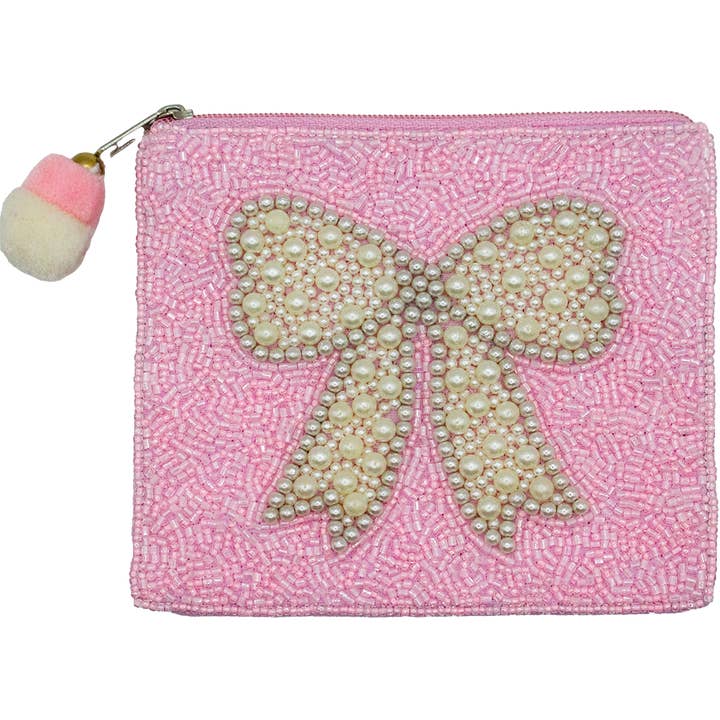 Pochette à pièces perlée avec nœud pour la vente par Pizzazz, Inc.