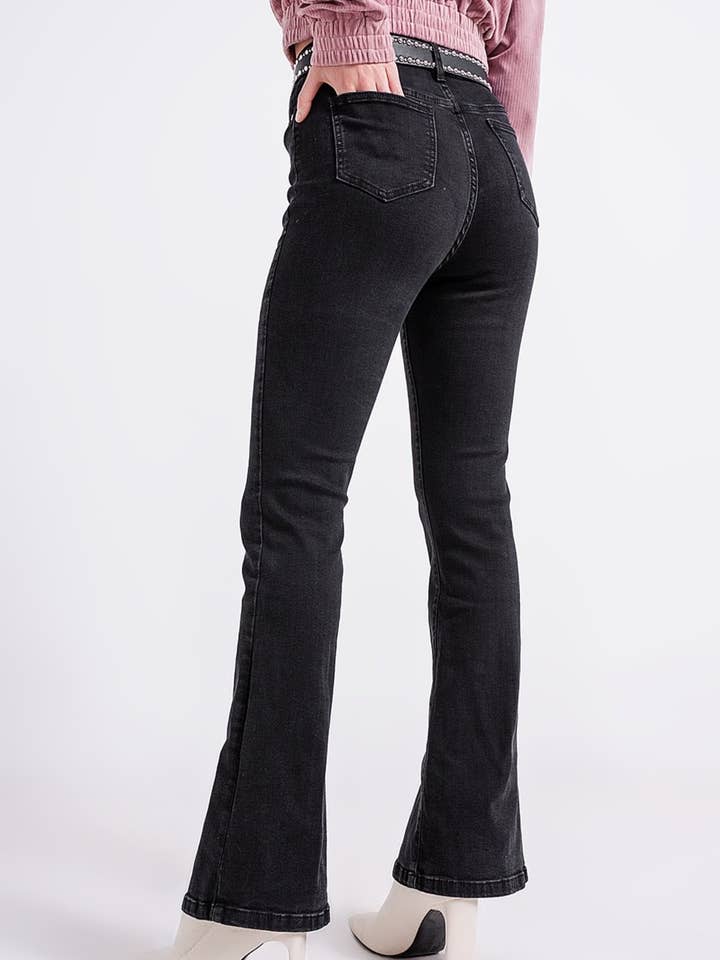 Flare black jeans with split hem for wholesale on Faire