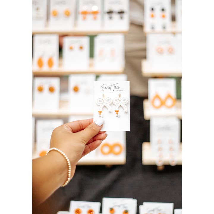 Sweet Tree - Wholesale Dangle Earrings - White and Orange Bow Jewelry | Gifts, Tennessee, Vols1