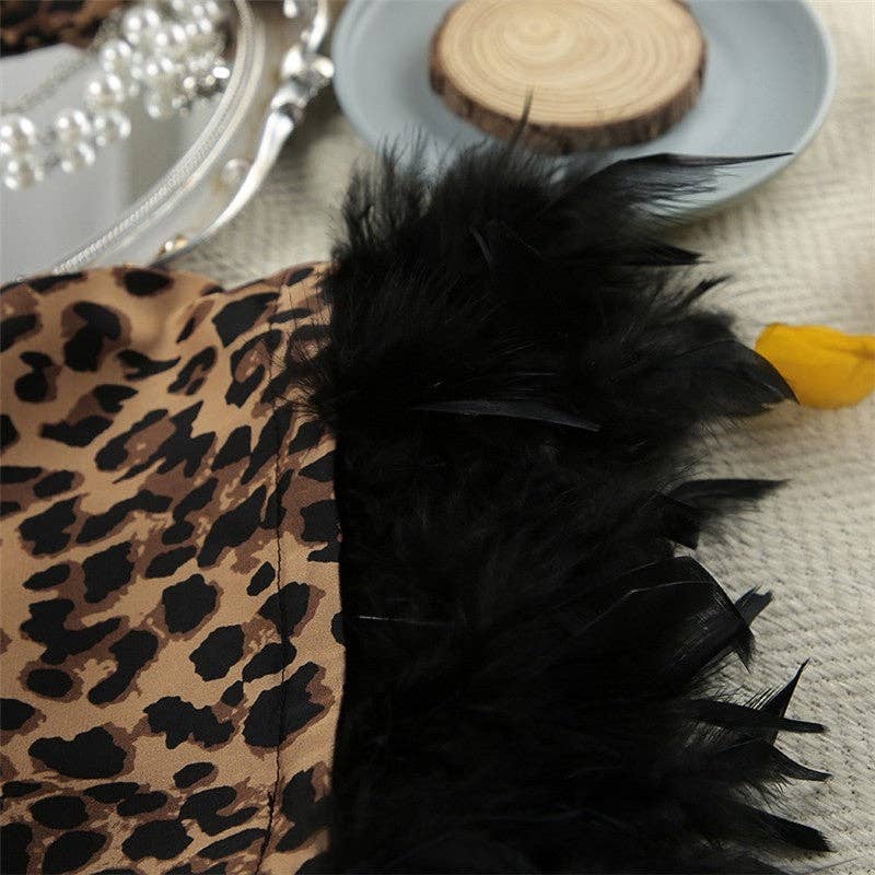 LEOPARDO Abito lungo con scollo a V patchwork in piume con stampa leopardata in vendita all'ingrosso su Faire4