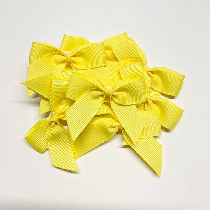 Giallo - Fiocchi medi in gros grain per la vendita all'ingrosso da parte di TLLC Supplies