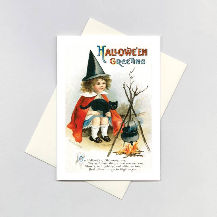 Pige heks på et lejrbål - Halloween-kort for engroshandel hos Laughing Elephant