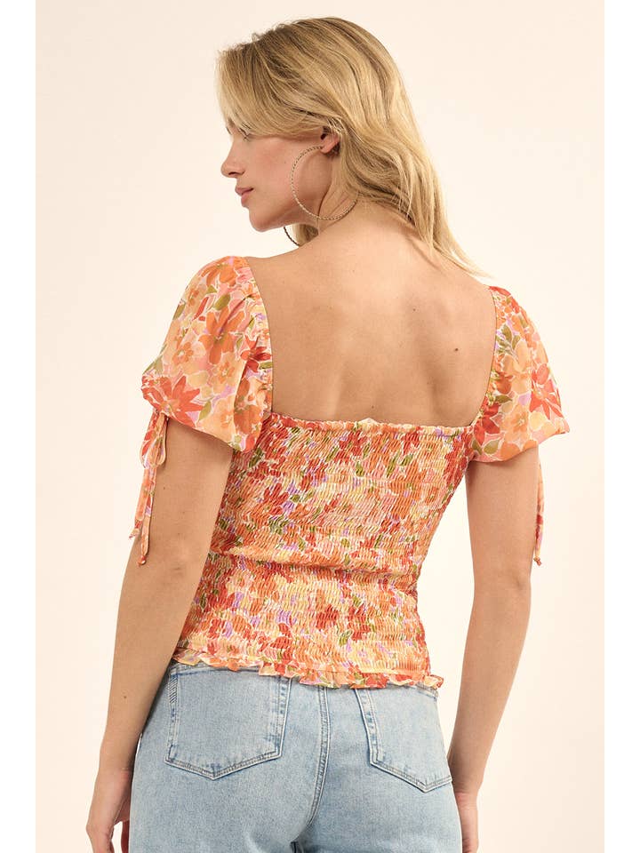 SUNBAKED Smocked Floral Ruffled Puff-Sleeve Peasant Top for wholesale on Faire4