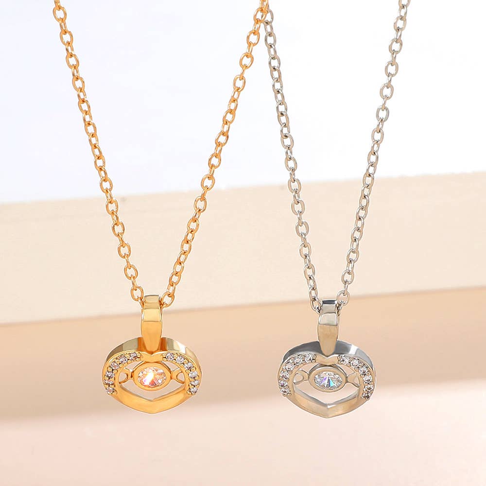 Gemscape UK - Vente Colliers à pendentif - Collier en forme de cœur en or et argent : des bijoux pour tous8