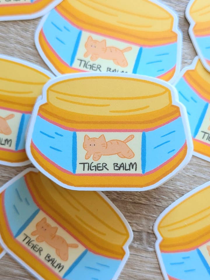 Tiger Balm Matte Vinyl Sticker for wholesale by Fruit Cats Studio