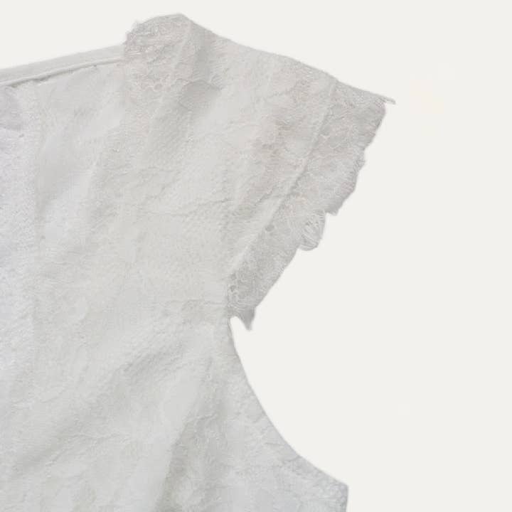 Branco Bodysuit sexy de renda transparente branco com cílios e gola com gola e gola sem mangas para venda a revendedores na Faire2