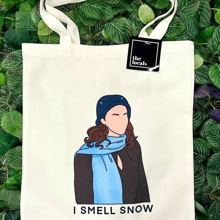 Gilmore Girls "I Smell Snow" Tote Bag for wholesale by The Locals