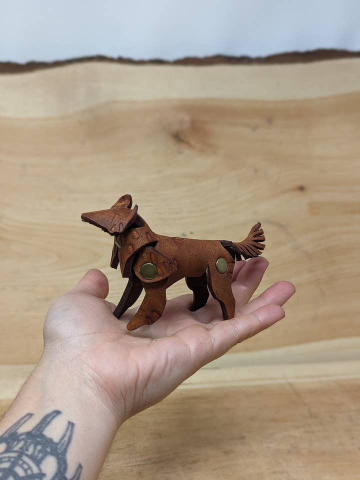 Customizable Little Leather Wolf Figurines for wholesale by Frost & Ember Creations, LLC