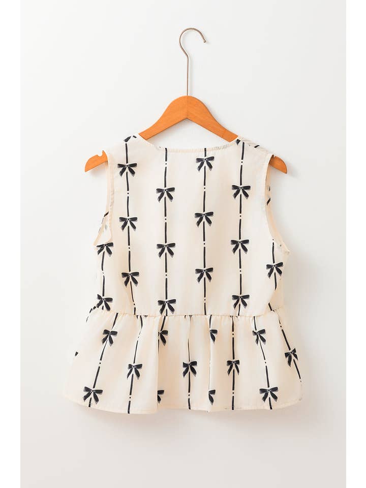 White Bow Tie Front Peplum Top for wholesale on Faire