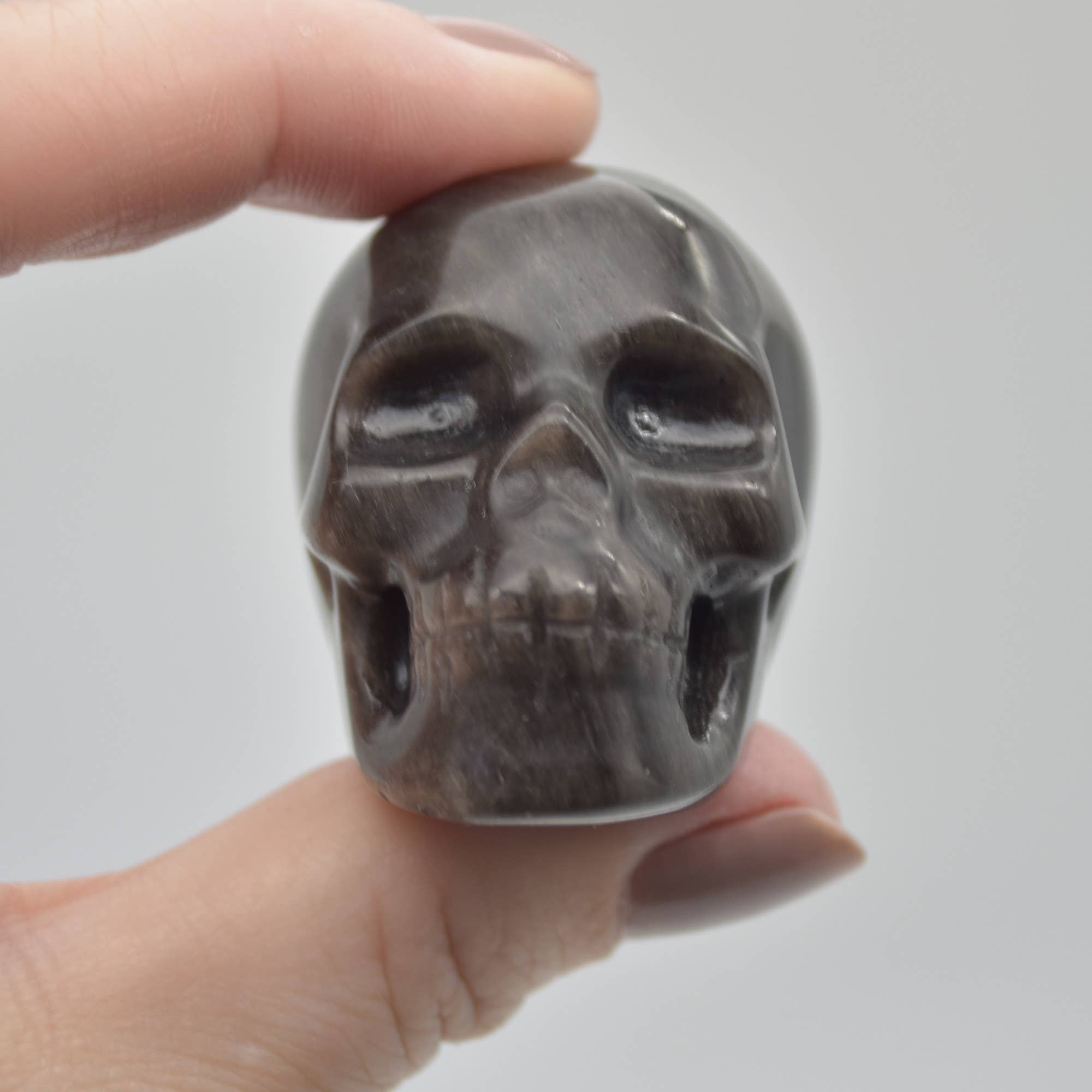 Zwart Zilveren Glans Obsidiaan Gesneden Schedelhoofd - 3,5 cm - 1 Stuk #01 voor groothandel op Faire4