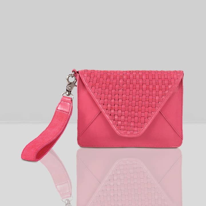 'CRESCENT' Pink Leather Flap-over Woven Clutch Bag and other Purchase Wholesale x over bag. Free Returns & Net 60 Terms on Faire trending on Faire.