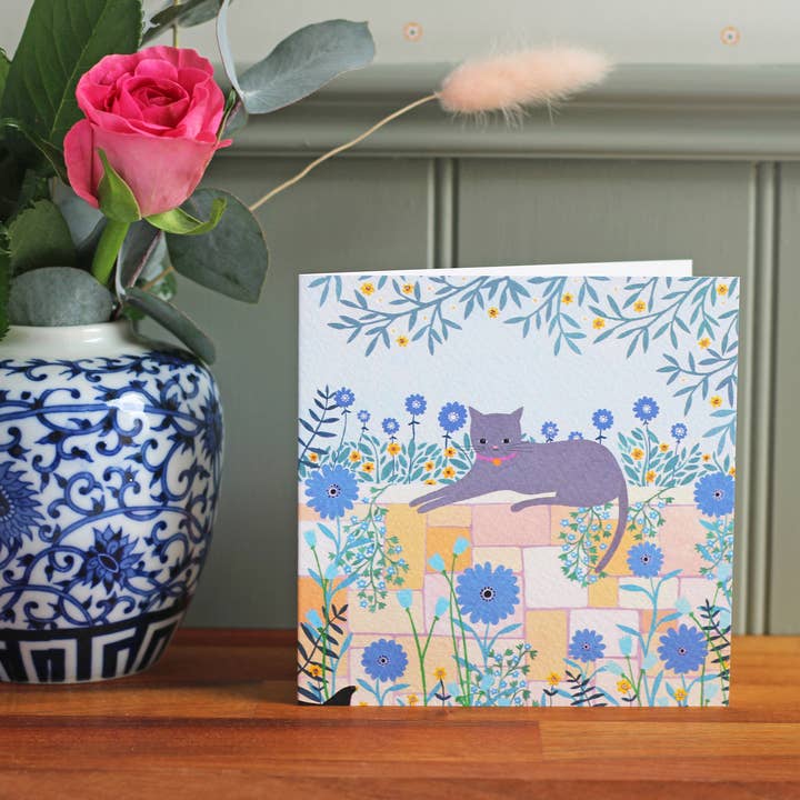 Cat On Wall Greeting Card for wholesale by Sian Summerhayes