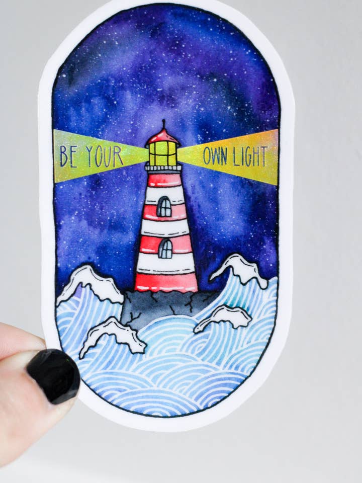Be Your Own Light | Mental Health Holo Lighthouse Sticker for wholesale by Scribbles and Doodlez