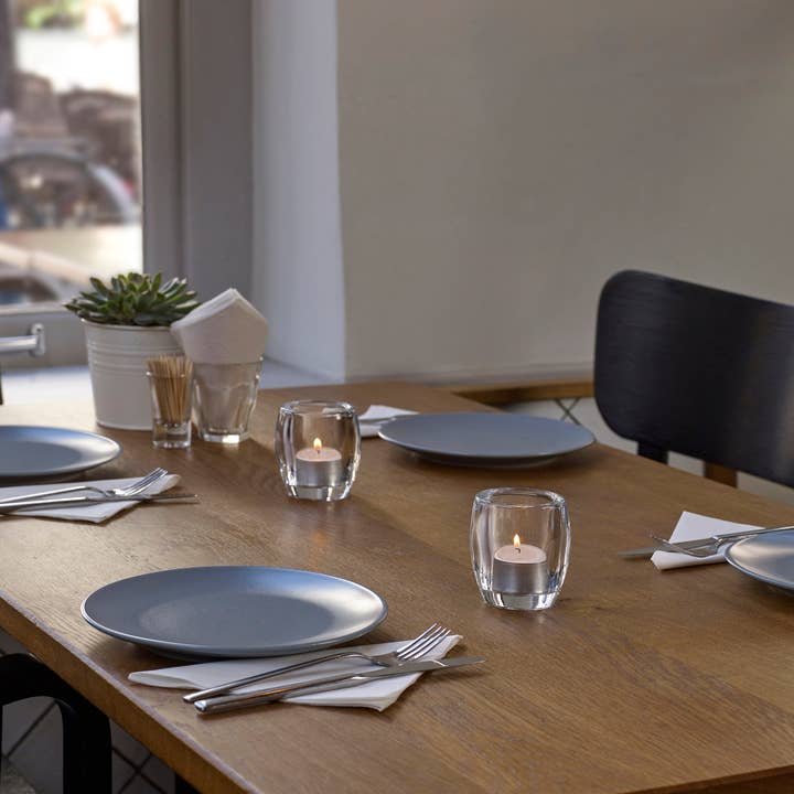 8 Hour White Tea Lights In Clear Cup Set Of 48 Tealights for wholesale on Faire5