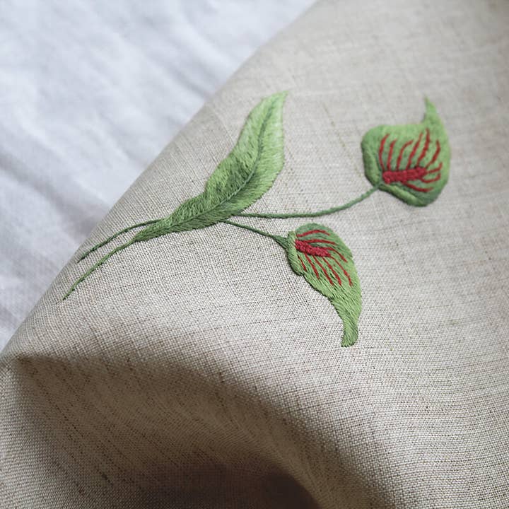 Hand Embroidered Linen Guest Towel – Flamingo Flower on Natural for wholesale by Gordonsbury