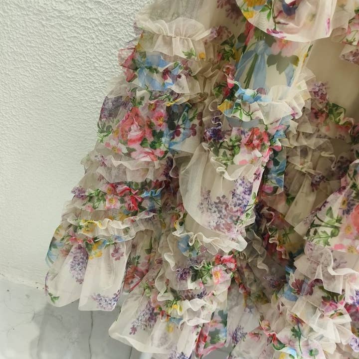 Productseeker - Wholesale Skirt - Women's - SK032 Colorful Floral Mesh Skirt with Irregular Stitching