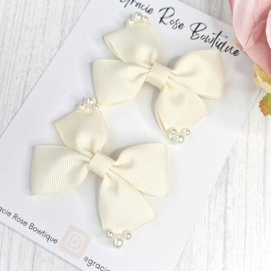 Ivory Ribbon Hair Bows: Pearl Embellished Alligator Clips for wholesale by Gracie Rose Bowtique