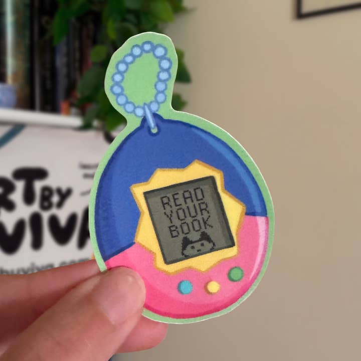 Autocollant Kindle Livre Tamagotchi pour la vente par Art by Viva