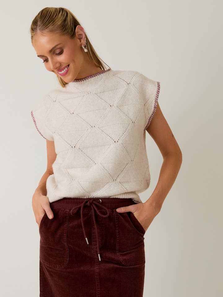 CRÈME MAUVE Haut de pull à col montant et épaules larges en vente sur Faire0