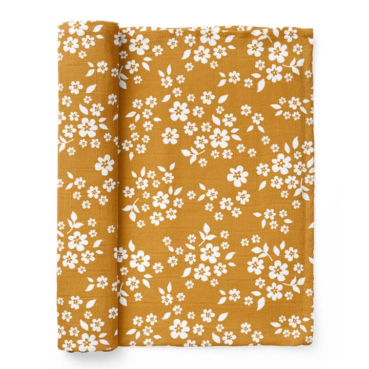 Whimsy Floral Mustard Swaddle for wholesale by Mini Wander, LLC