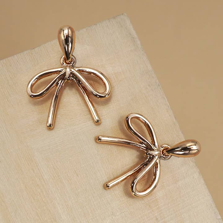 Gold TEARDROP STUD BOW CHARM DROP EARRINGS | 80E06258 for wholesale on Faire